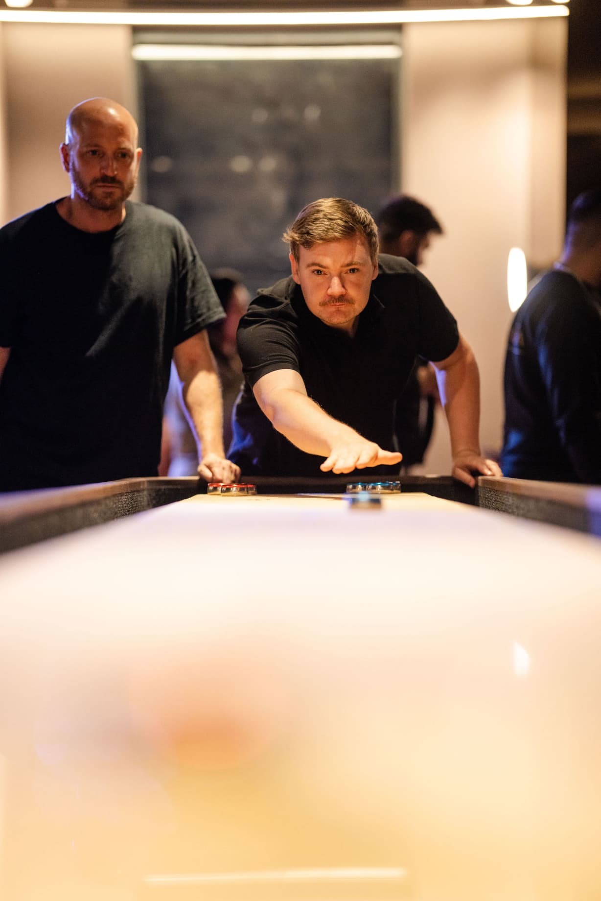 Residents at the pool table, One Eastside